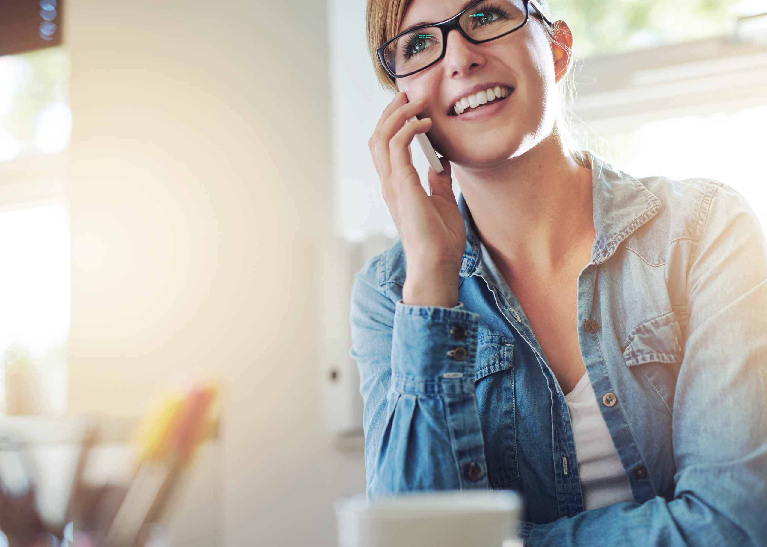 A homeowner calling an expert for her homes water damage.